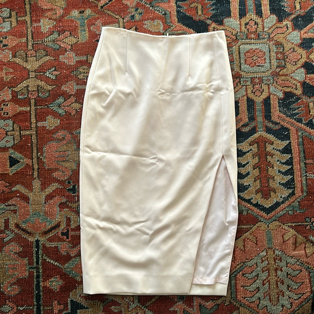 Pale pink pencil skirt with slit
